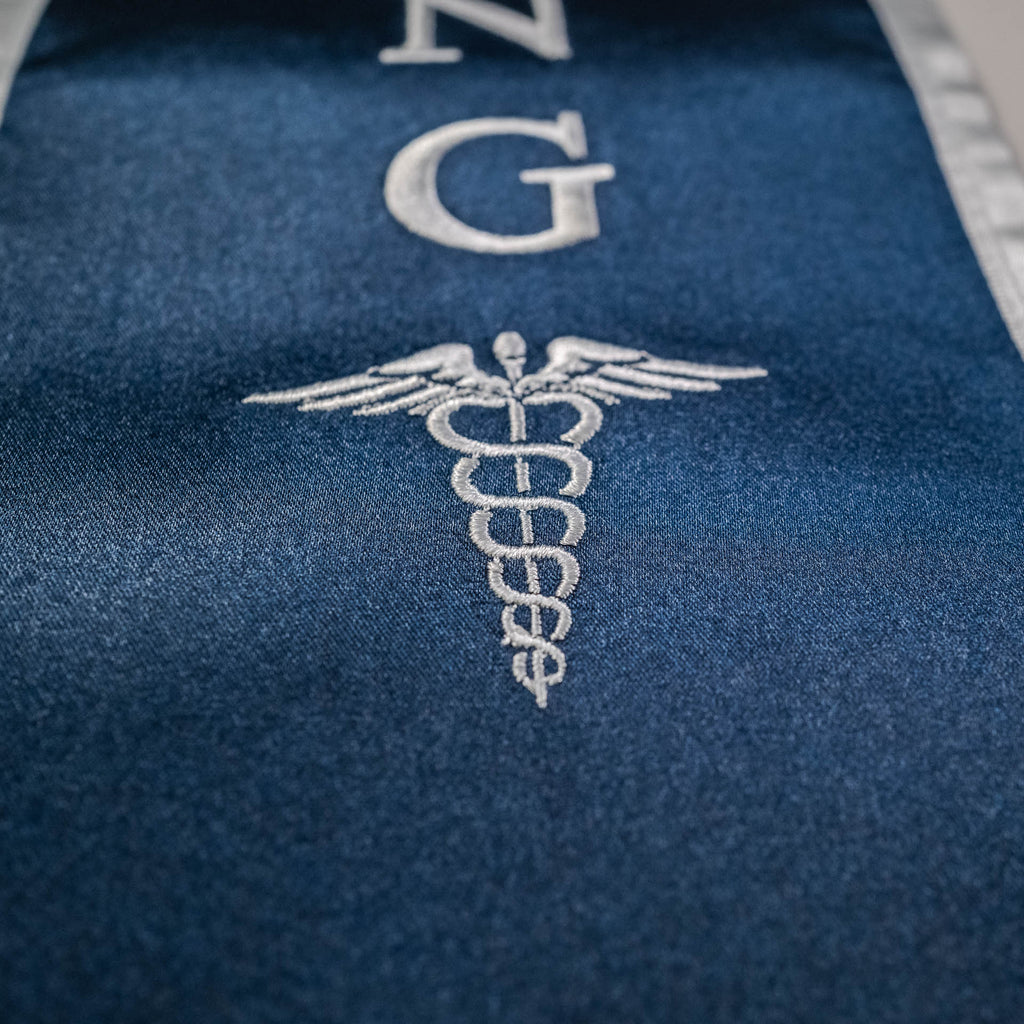 Custom graduation stole with sharp embroidered logo on luxury satin